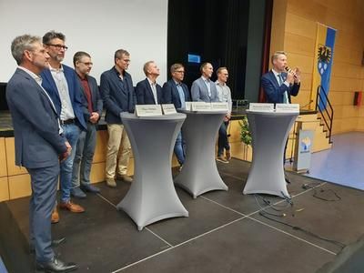 Die Referenten des Abend auf den Podium